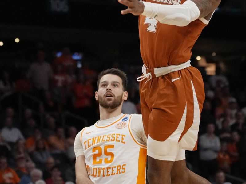 March 23, 2024, Charlotte, NC, USA; Texas Longhorns guard Tyrese Hunter (4) shoots against the Tennessee Volunteers in the second round of the 2024 NCAA Tournament at the Spectrum Center. Mandatory Credit: Jim Dedmon-USA TODAY Sports