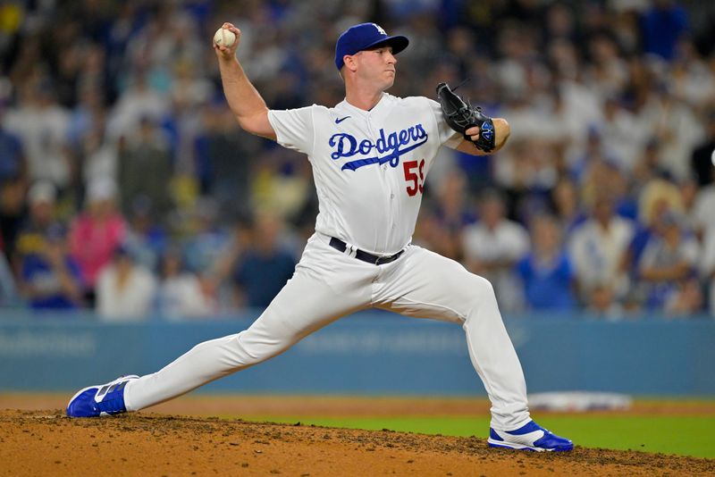 Aug 17, 2023; Los Angeles, California, USA;  Los Angeles Dodgers relief pitcher Evan Phillips (59) throws in the ninth inning against the Milwaukee Brewers at Dodger Stadium. Mandatory Credit: Jayne Kamin-Oncea-USA TODAY Sports