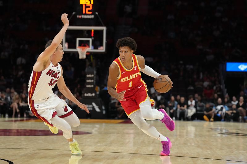 MIAMI, FL - OCTOBER 16: Jalen Johnson #1 of the Atlanta Hawks drives to the basket during the game against the Miami Heat during a preseason game on October 16, 2024 at Kaseya Center in Miami, Florida. NOTE TO USER: User expressly acknowledges and agrees that, by downloading and or using this Photograph, user is consenting to the terms and conditions of the Getty Images License Agreement. Mandatory Copyright Notice: Copyright 2024 NBAE (Photo by Eric Espada/NBAE via Getty Images)