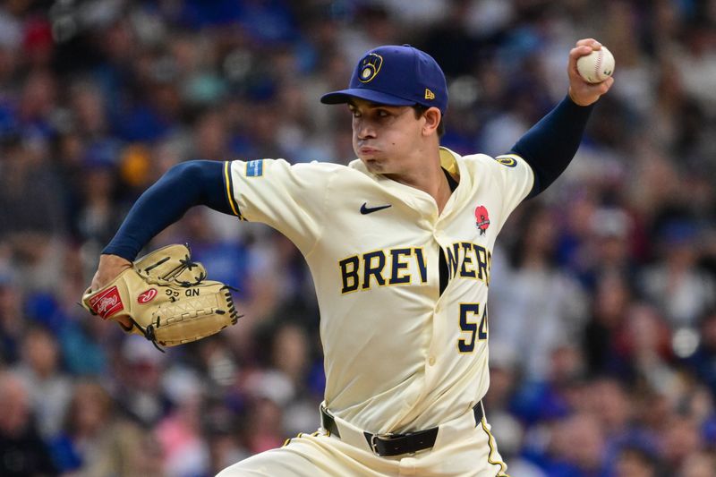 May 27, 2024; Milwaukee, Wisconsin, USA;  Milwaukee Brewers starting pitcher Robert Gasser (54) throws a pitch in the first inning against the Chicago Cubs at American Family Field. Mandatory Credit: Benny Sieu-USA TODAY Sports