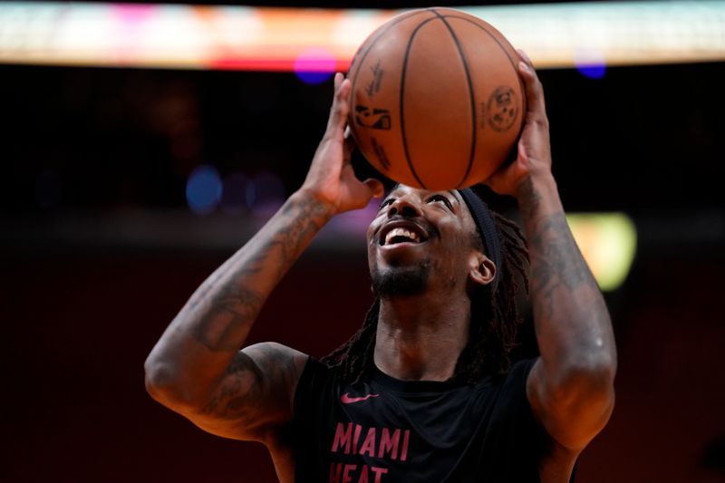 MIAMI, FLORIDA - MARCH 22: Delon Wright #4 of the Miami Heat warms up prior to a game against the New Orleans Pelicans at Kaseya Center on March 22, 2024 in Miami, Florida. NOTE TO USER: User expressly acknowledges and agrees that, by downloading and or using this photograph, User is consenting to the terms and conditions of the Getty Images License Agreement. (Photo by Rich Storry/Getty Images)