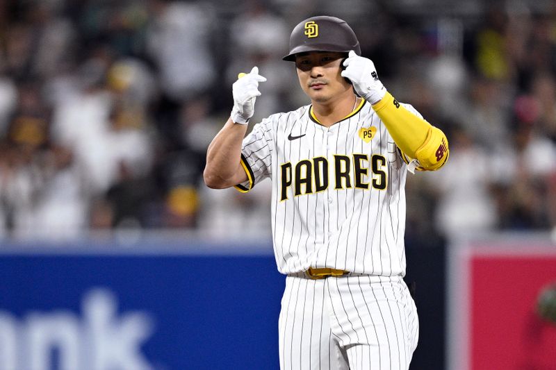 Jul 6, 2024; San Diego, California, USA; San Diego Padres shortstop Ha-Seong Kim (7) celebrates after hitting a double against the Arizona Diamondbacks during the fifth inning at Petco Park. Mandatory Credit: Orlando Ramirez-USA TODAY Sports