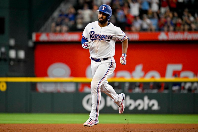 Aug 3, 2023; Arlington, Texas, USA; Texas Rangers second baseman Marcus Semien (2) rounds the bases after he hits a home run against the Chicago White Sox during the fourth inning at Globe Life Field. Mandatory Credit: Jerome Miron-USA TODAY Sports