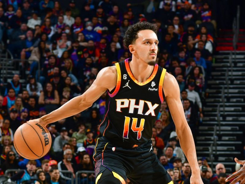 PHOENIX, AZ - JANUARY 6:  Landry Shamet #14 of the Phoenix Suns drives to the basket during the game against the Miami Heat on January 6, 2023 at Footprint Center in Phoenix, Arizona. NOTE TO USER: User expressly acknowledges and agrees that, by downloading and or using this photograph, user is consenting to the terms and conditions of the Getty Images License Agreement. Mandatory Copyright Notice: Copyright 2023 NBAE (Photo by Kate Frese/NBAE via Getty Images)