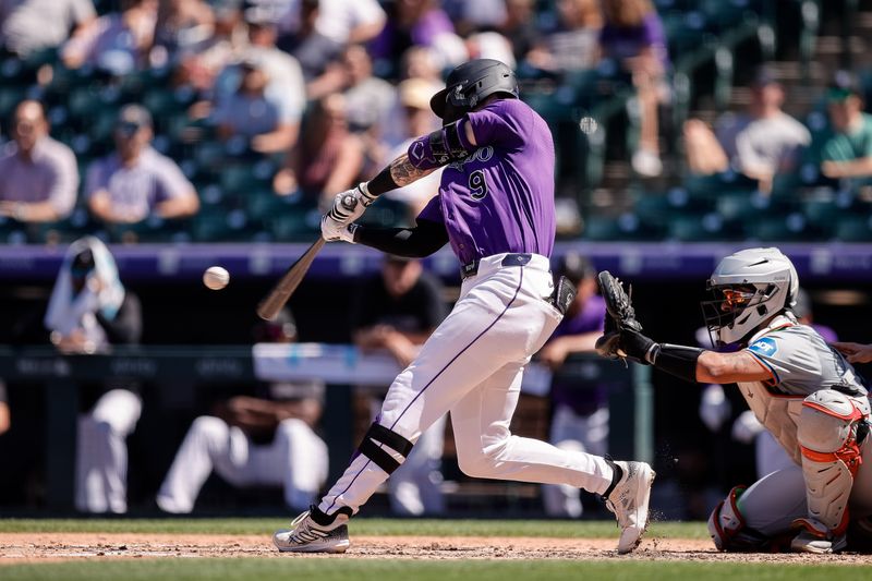 Aug 29, 2024; Denver, Colorado, USA; Colorado Rockies center fielder Brenton Doyle (9) hits a solo home run in the third inning against the Miami Marlins at Coors Field. Mandatory Credit: Isaiah J. Downing-USA TODAY Sports