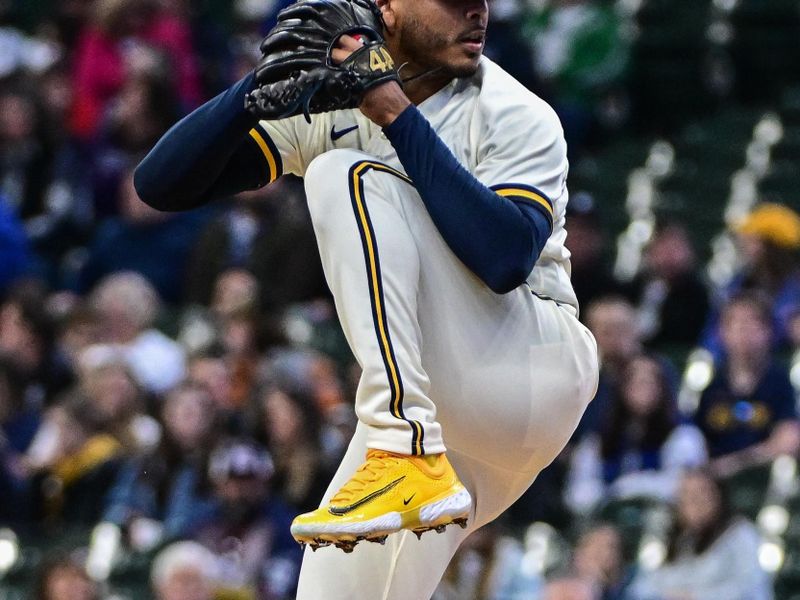 Apr 26, 2023; Milwaukee, Wisconsin, USA; Milwaukee Brewers pitcher Freddy Peralta (51) throws a pitch in the first inning against the Detroit Tigers at American Family Field. Mandatory Credit: Benny Sieu-USA TODAY Sports