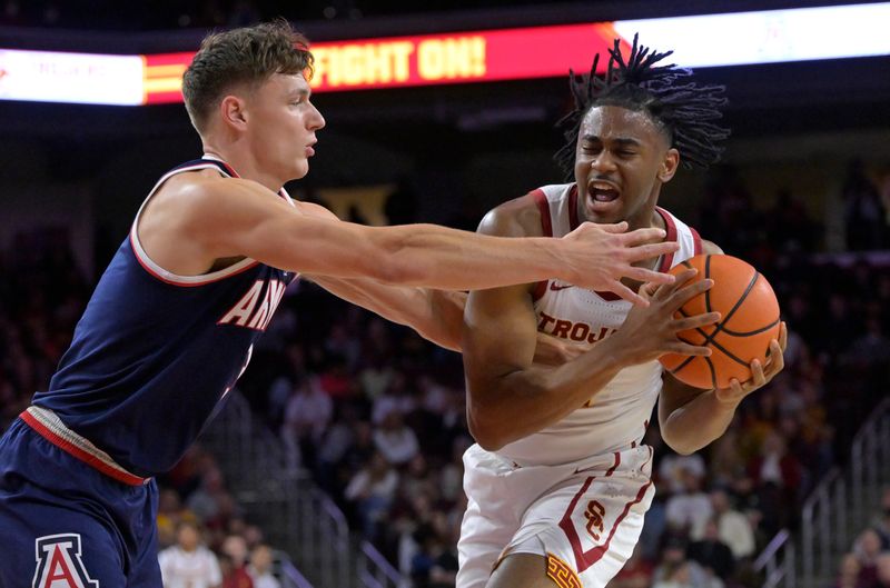 Mar 2, 2023; Los Angeles, California, USA;  Arizona Wildcats guard Pelle Larsson (3) defends USC Trojans guard Reese Dixon-Waters (2) in the first half at Galen Center. Mandatory Credit: Jayne Kamin-Oncea-USA TODAY Sports