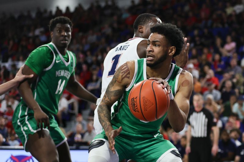 Jan 28, 2024; Boca Raton, Florida, USA; North Texas Mean Green guard Rondel Walker (5) controls the basketball against the Florida Atlantic Owls during the first half at Eleanor R. Baldwin Arena. Mandatory Credit: Sam Navarro-USA TODAY Sports