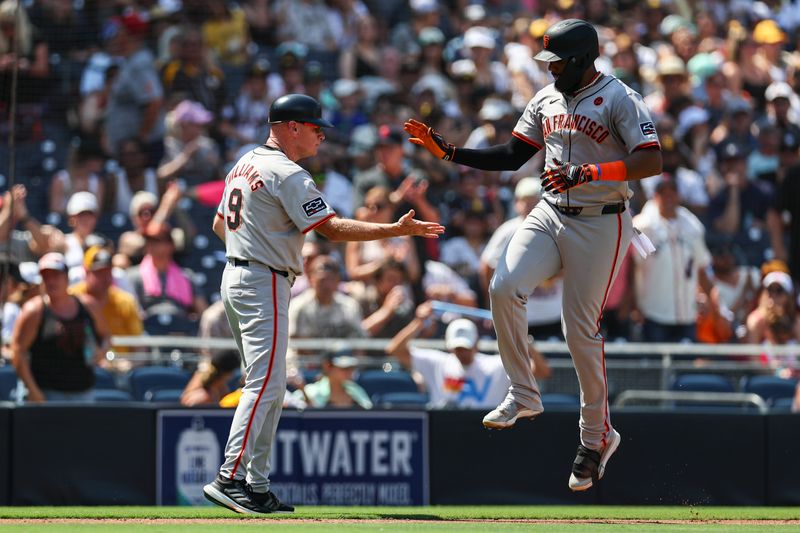 Sep 8, 2024; San Diego, California, USA; San Francisco Giants right fielder Jerar Encarnacion (59) rounds the bases after hitting a three run home run during the fourth inning against the San Diego Padres at Petco Park. Mandatory Credit: Chadd Cady-Imagn Images