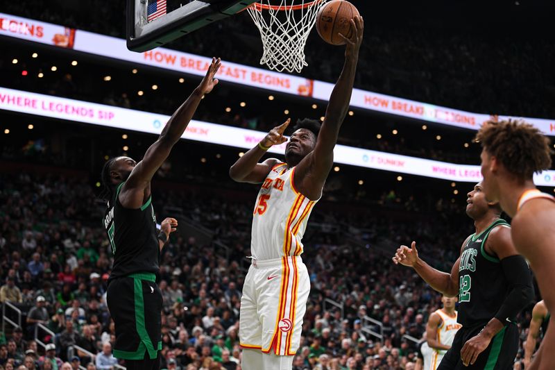 BOSTON, MASSACHUSETTS - NOVEMBER 12: Clint Capela #15 of the Atlanta Hawks does a layup against the Boston Celtics during the first half of an Emirates NBA cup game at TD Garden on November 12, 2024 in Boston, Massachusetts. NOTE TO USER: User expressly acknowledges and agrees that, by downloading and or using this photograph, User is consenting to the terms and conditions of the Getty Images License Agreement. (Photo by China Wong/Getty Images)