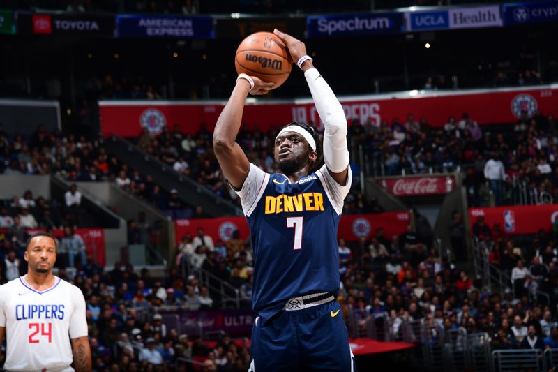 LOS ANGELES, CA - APRIL 4: Reggie Jackson #7 of the Denver Nuggets shoots a free throw during the game against the LA Clippers on April 4, 2024 at Crypto.Com Arena in Los Angeles, California. NOTE TO USER: User expressly acknowledges and agrees that, by downloading and/or using this Photograph, user is consenting to the terms and conditions of the Getty Images License Agreement. Mandatory Copyright Notice: Copyright 2024 NBAE (Photo by Adam Pantozzi/NBAE via Getty Images)