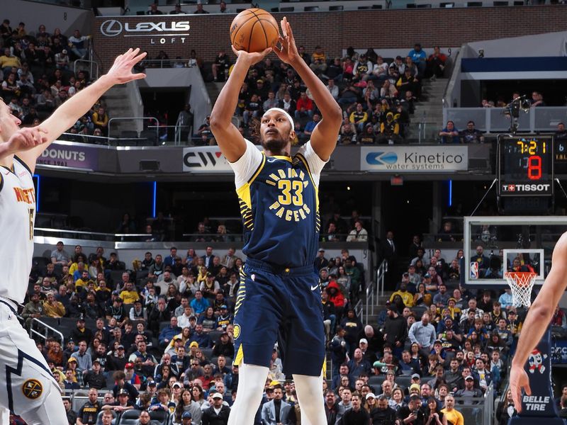 INDIANAPOLIS, IN - JANUARY 23: Myles Turner #33 of the Indiana Pacers shoots the ball during the game against the Denver Nuggets on January 23, 2024 at Gainbridge Fieldhouse in Indianapolis, Indiana. NOTE TO USER: User expressly acknowledges and agrees that, by downloading and or using this Photograph, user is consenting to the terms and conditions of the Getty Images License Agreement. Mandatory Copyright Notice: Copyright 2024 NBAE (Photo by Ron Hoskins/NBAE via Getty Images)