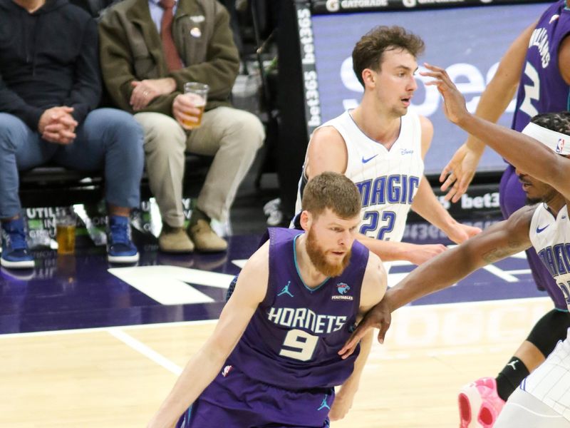 CHARLOTTE, NC - MARCH 5: Davis Bertans #9 of the Charlotte Hornets drives to the basket during the game against the Orlando Magic on March 5, 2024 at Spectrum Center in Charlotte, North Carolina. NOTE TO USER: User expressly acknowledges and agrees that, by downloading and or using this photograph, User is consenting to the terms and conditions of the Getty Images License Agreement.  Mandatory Copyright Notice:  Copyright 2024 NBAE (Photo by Brock Williams-Smith/NBAE via Getty Images)