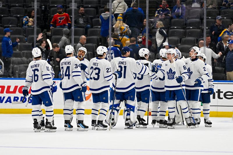 Feb 19, 2024; St. Louis, Missouri, USA;  Toronto Maple Leafs celebrate after defeating the St. Louis Blues at Enterprise Center. Mandatory Credit: Jeff Curry-USA TODAY Sports