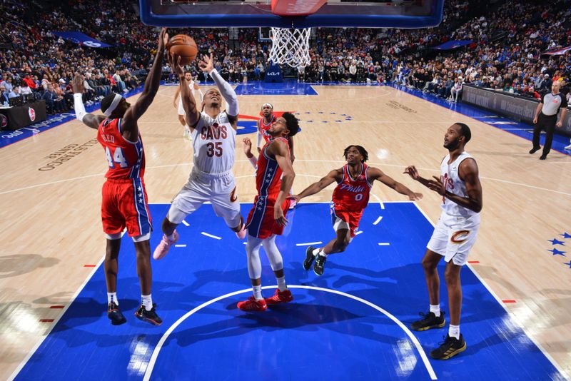 PHILADELPHIA, PA - FEBRUARY 23: Isaac Okoro #35 of the Cleveland Cavaliers drives to the basket during the game against the Philadelphia 76ers on February 23, 2024 at the Wells Fargo Center in Philadelphia, Pennsylvania NOTE TO USER: User expressly acknowledges and agrees that, by downloading and/or using this Photograph, user is consenting to the terms and conditions of the Getty Images License Agreement. Mandatory Copyright Notice: Copyright 2024 NBAE (Photo by Jesse D. Garrabrant/NBAE via Getty Images)