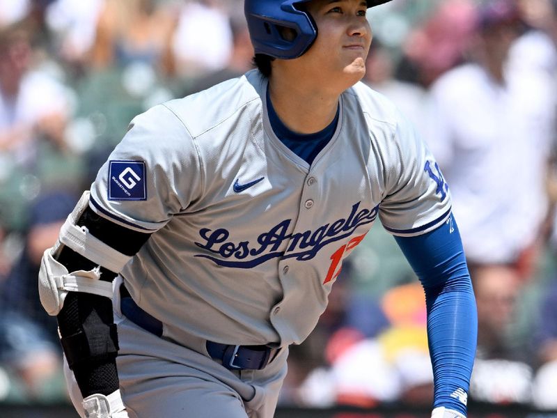 Jul 13, 2024; Detroit, Michigan, USA; Los Angeles Dodgers designated hitter Shohei Ohtani (17) hits a solo home run against the  Detroit Tigers in the fifth inning at Comerica Park. Mandatory Credit: Lon Horwedel-USA TODAY Sports