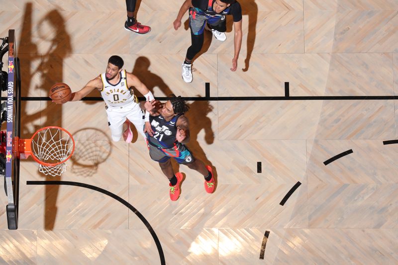 BROOKLYN, NY - APRIL 3: Tyrese Haliburton #0 of the Indiana Pacers drives to the basket during the game against the Brooklyn Nets on April 3, 2024 at Barclays Center in Brooklyn, New York. NOTE TO USER: User expressly acknowledges and agrees that, by downloading and or using this Photograph, user is consenting to the terms and conditions of the Getty Images License Agreement. Mandatory Copyright Notice: Copyright 2024 NBAE (Photo by Nathaniel S. Butler/NBAE via Getty Images)