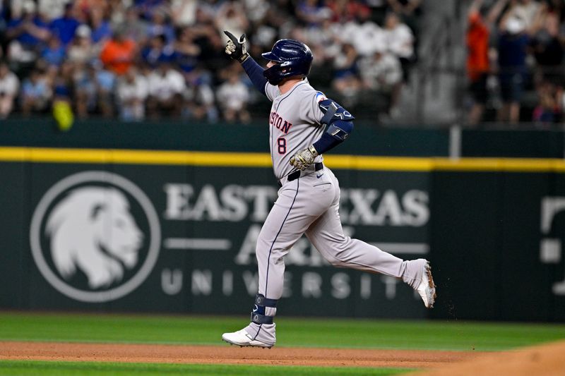 May 16, 2025; Arlington, Texas, USA; Houston Astros first baseman Christian Walker (8) rounds the bases after he hits a three run home run against the Texas Rangers during the seventh inning at Globe Life Field. Mandatory Credit: Jerome Miron-Imagn Images