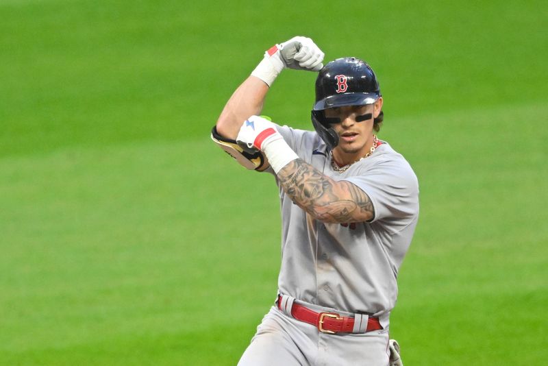 Jun 8, 2023; Cleveland, Ohio, USA; Boston Red Sox center fielder Jarren Duran (16) celebrates his RBI single in the fifth inning against the Cleveland Guardians at Progressive Field. Mandatory Credit: David Richard-USA TODAY Sports