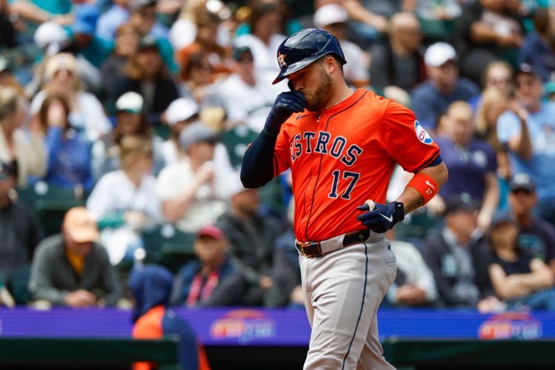 May 30, 2024; Seattle, Washington, USA; Houston Astros catcher Victor Caratini (17) reacts after hitting a solo-home run against the Seattle Mariners during the fifth inning at T-Mobile Park. Mandatory Credit: Joe Nicholson-USA TODAY Sports