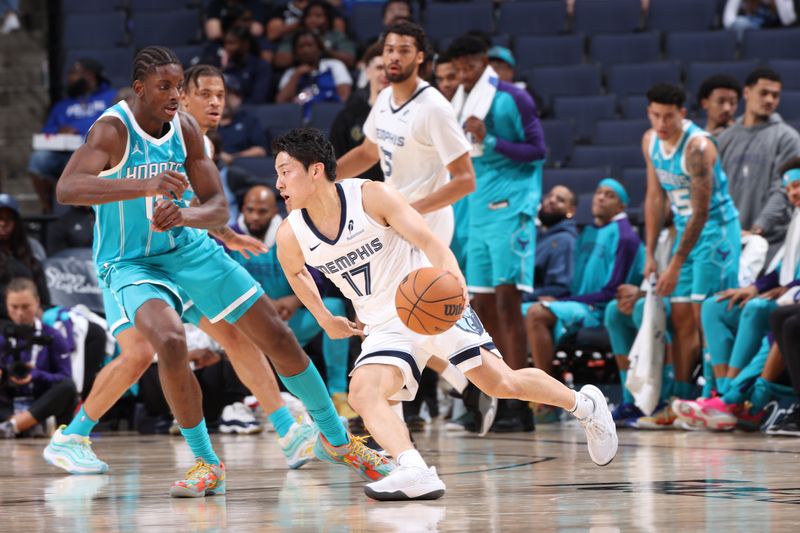 MEMPHIS, TN - OCTOBER 10: Yuki Kawamura #17 of the Memphis Grizzlies drives to the basket during the game against the Charlotte Hornets during a NBA Preseason game on October 10, 2024 at FedExForum in Memphis, Tennessee. NOTE TO USER: User expressly acknowledges and agrees that, by downloading and or using this photograph, User is consenting to the terms and conditions of the Getty Images License Agreement. Mandatory Copyright Notice: Copyright 2024 NBAE (Photo by Joe Murphy/NBAE via Getty Images)