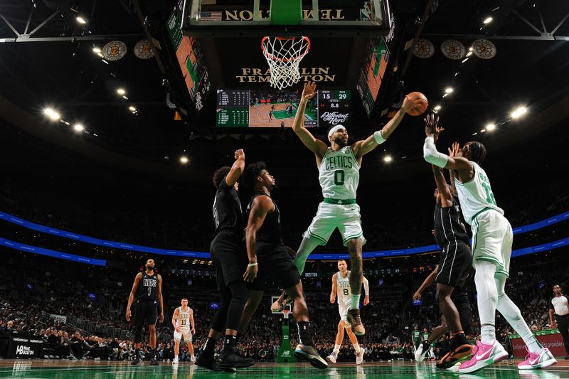 BOSTON, MA - FEBRUARY 14: Jayson Tatum #0 of the Boston Celtics reaches for the ball during the game against the Brooklyn Nets on February 14, 2024 at the TD Garden in Boston, Massachusetts. NOTE TO USER: User expressly acknowledges and agrees that, by downloading and or using this photograph, User is consenting to the terms and conditions of the Getty Images License Agreement. Mandatory Copyright Notice: Copyright 2024 NBAE  (Photo by Brian Babineau/NBAE via Getty Images)