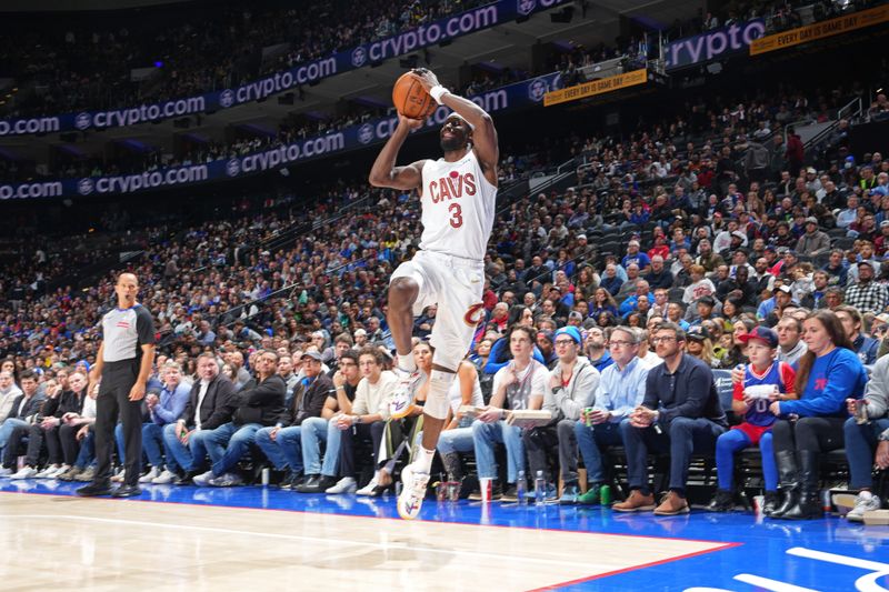 PHILADELPHIA, PA - NOVEMBER 13: Caris LeVert #3 of the Cleveland Cavaliers shoots a three point basket during the game against the Philadelphia 76ers on November 13, 2024 at the Wells Fargo Center in Philadelphia, Pennsylvania NOTE TO USER: User expressly acknowledges and agrees that, by downloading and/or using this Photograph, user is consenting to the terms and conditions of the Getty Images License Agreement. Mandatory Copyright Notice: Copyright 2024 NBAE (Photo by Jesse D. Garrabrant/NBAE via Getty Images)