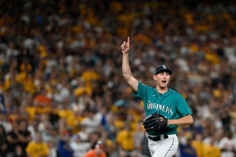 Aug 12, 2023; Seattle, Washington, USA; Seattle Mariners starting pitcher George Kirby (68) calls for a fly ball before making the catch for the final out of the inning against the Baltimore Orioles during the ninth inning at T-Mobile Park. Mandatory Credit: Steven Bisig-USA TODAY Sports