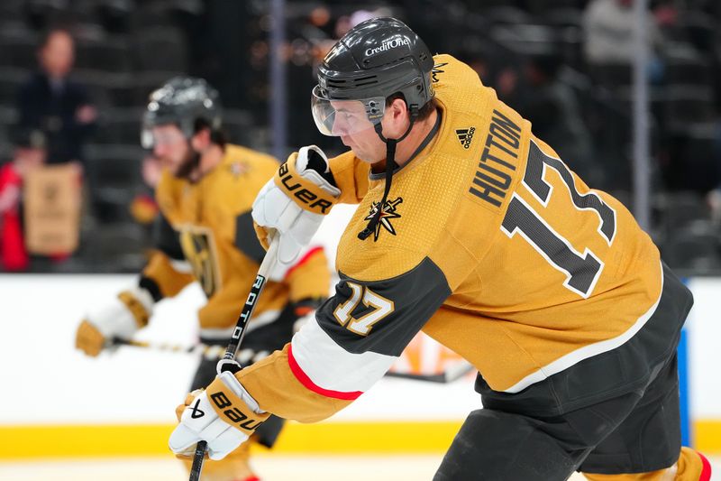 sFeb 20, 2024; Las Vegas, Nevada, USA; Vegas Golden Knights defenseman Ben Hutton (17) warms up before a game against the Nashville Predators at T-Mobile Arena. Mandatory Credit: Stephen R. Sylvanie-USA TODAY Sports