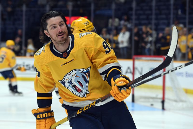 Nov 12, 2022; Nashville, Tennessee, USA; Nashville Predators center Matt Duchene (95) skates during warmups before the game against the New York Rangers at Bridgestone Arena. Mandatory Credit: Christopher Hanewinckel-USA TODAY Sports