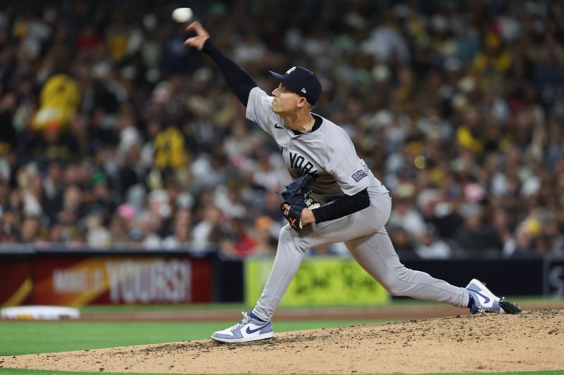 May 25, 2024; San Diego, California, USA; New York Yankees relief pitcher Luke Weaver (30) pitches during the seventh inning against the San Diego Padres at Petco Park. Mandatory Credit: Chadd Cady-USA TODAY Sports