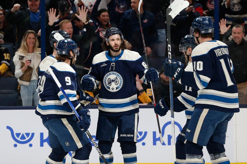 Nov 14, 2023; Columbus, Ohio, USA; Columbus Blue Jackets right wing Kirill Marchenko (86) celebrates his goal against the Pittsburgh Penguins during the first period at Nationwide Arena. Mandatory Credit: Russell LaBounty-USA TODAY Sports