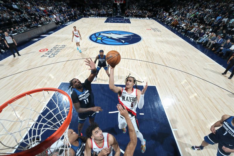 MINNEAPOLIS, MN -  MARCH 4: Dalano Banton #5 of the Portland Trail Blazers drives to the basket during the game against the Minnesota Timberwolves on March 4, 2024 at Target Center in Minneapolis, Minnesota. NOTE TO USER: User expressly acknowledges and agrees that, by downloading and or using this Photograph, user is consenting to the terms and conditions of the Getty Images License Agreement. Mandatory Copyright Notice: Copyright 2024 NBAE (Photo by David Sherman/NBAE via Getty Images)