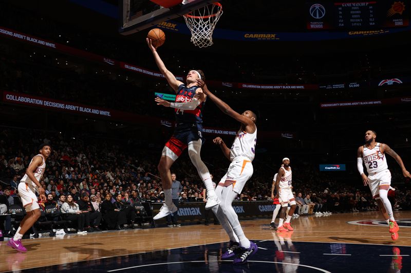 WASHINGTON, DC -?JANUARY 16 : Corey Kispert #24 of the Washington Wizards drives to the basket during the game against the Phoenix Suns on January 16, 2025 at Capital One Arena in Washington, DC. NOTE TO USER: User expressly acknowledges and agrees that, by downloading and or using this Photograph, user is consenting to the terms and conditions of the Getty Images License Agreement. Mandatory Copyright Notice: Copyright 2024 NBAE (Photo by Stephen Gosling/NBAE via Getty Images)