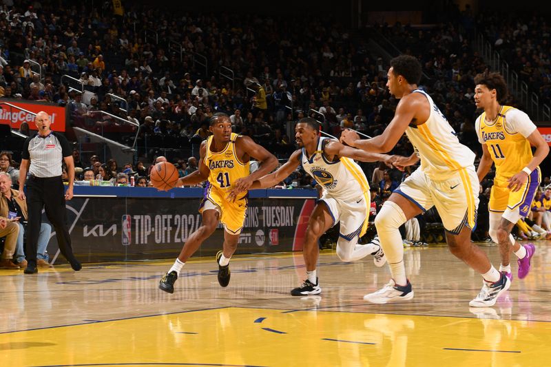 SAN FRANCISCO, CA - OCTOBER 18: Quincy Olivari #41 of the Los Angeles Lakers handles the ball during the game against the Golden State Warriors during a NBA Preseason game on October 18, 2024 at Chase Center in San Francisco, California. NOTE TO USER: User expressly acknowledges and agrees that, by downloading and or using this photograph, user is consenting to the terms and conditions of Getty Images License Agreement. Mandatory Copyright Notice: Copyright 2024 NBAE (Photo by Noah Graham/NBAE via Getty Images)