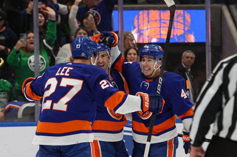 Mar 16, 2024; Elmont, New York, USA; New York Islanders center Jean-Gabriel Pageau (44) celebrates his goal against the Ottawa Senators during the second period at UBS Arena. Mandatory Credit: Thomas Salus-USA TODAY Sports