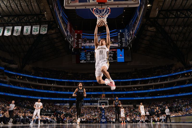 DALLAS, TX - JANUARY 15: Dyson Daniels #11 of the New Orleans Pelicans drives to the basket during the game against the Dallas Mavericks on January 15, 2024 at the American Airlines Center in Dallas, Texas. NOTE TO USER: User expressly acknowledges and agrees that, by downloading and or using this photograph, User is consenting to the terms and conditions of the Getty Images License Agreement. Mandatory Copyright Notice: Copyright 2024 NBAE (Photo by Glenn James/NBAE via Getty Images)