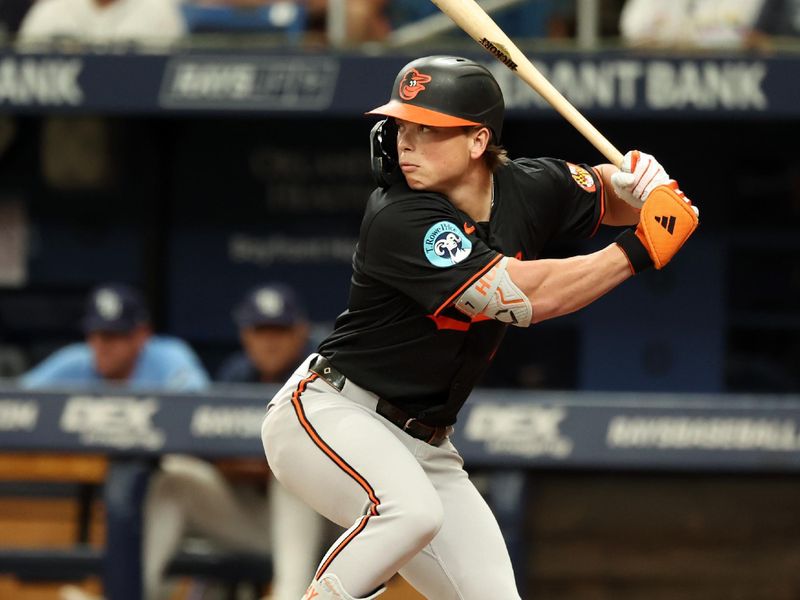 Aug 11, 2024; St. Petersburg, Florida, USA;Baltimore Orioles second base Jackson Holliday (7) at bat against the Tampa Bay Rays during the third inning at Tropicana Field. Mandatory Credit: Kim Klement Neitzel-USA TODAY Sports