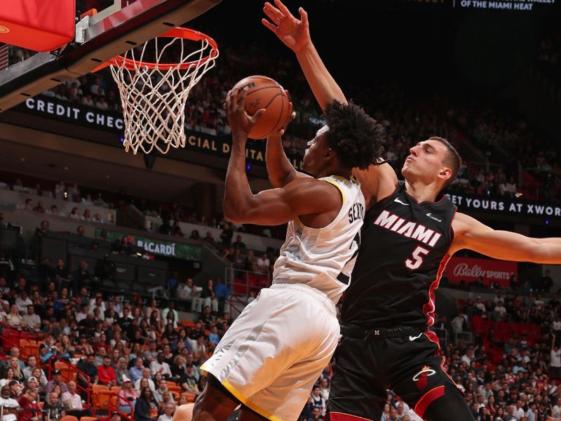 MIAMI, FL - MARCH 2: Colin Sexton #2 of the Utah Jazz drives to the basket during the game against the Miami Heat on March 2, 2024 at Kaseya Center in Miami, Florida. NOTE TO USER: User expressly acknowledges and agrees that, by downloading and or using this Photograph, user is consenting to the terms and conditions of the Getty Images License Agreement. Mandatory Copyright Notice: Copyright 2024 NBAE (Photo by Issac Baldizon/NBAE via Getty Images)
