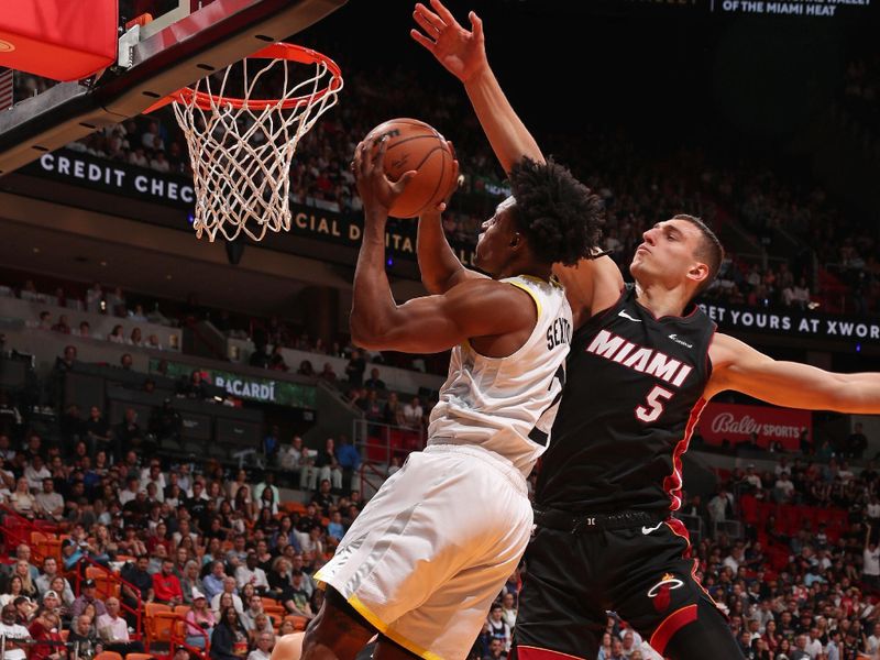 MIAMI, FL - MARCH 2: Colin Sexton #2 of the Utah Jazz drives to the basket during the game against the Miami Heat on March 2, 2024 at Kaseya Center in Miami, Florida. NOTE TO USER: User expressly acknowledges and agrees that, by downloading and or using this Photograph, user is consenting to the terms and conditions of the Getty Images License Agreement. Mandatory Copyright Notice: Copyright 2024 NBAE (Photo by Issac Baldizon/NBAE via Getty Images)