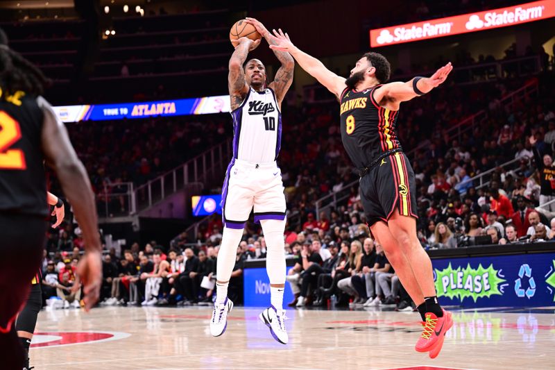 ATLANTA, GA - NOVEMBER 1: DeMar DeRozan #10 of the Sacramento Kings shoots the ball during the game against the Atlanta Hawks on November 1, 2024 at State Farm Arena in Atlanta, Georgia.  NOTE TO USER: User expressly acknowledges and agrees that, by downloading and/or using this Photograph, user is consenting to the terms and conditions of the Getty Images License Agreement. Mandatory Copyright Notice: Copyright 2024 NBAE (Photo by Adam Hagy/NBAE via Getty Images)