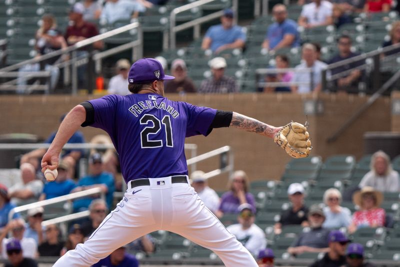 Mar 6, 2024; Salt River Pima-Maricopa, Arizona, USA; Colorado Rockies starting pitcher Kyle Freeland (21) warms up during a spring training game against the Texas Rangers at Salt River Fields at Talking Stick. Mandatory Credit: Allan Henry-USA TODAY Sports