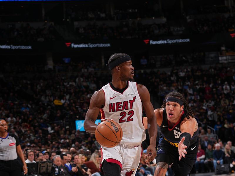 DENVER, CO - FEBRUARY 29: Jimmy Butler #22 of the Miami Heat handles the ball during the game against the Denver Nuggets on February 29, 2024 at the Ball Arena in Denver, Colorado. NOTE TO USER: User expressly acknowledges and agrees that, by downloading and/or using this Photograph, user is consenting to the terms and conditions of the Getty Images License Agreement. Mandatory Copyright Notice: Copyright 2024 NBAE (Photo by Bart Young/NBAE via Getty Images)