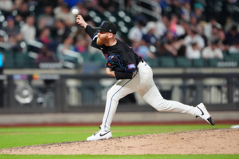 May 31, 2024; New York City, New York, USA; New York Mets pitcher Reed Garrett (75) delivers a pitch against the Arizona Diamondbacks during the ninth inning at Citi Field. Mandatory Credit: Gregory Fisher-USA TODAY Sports