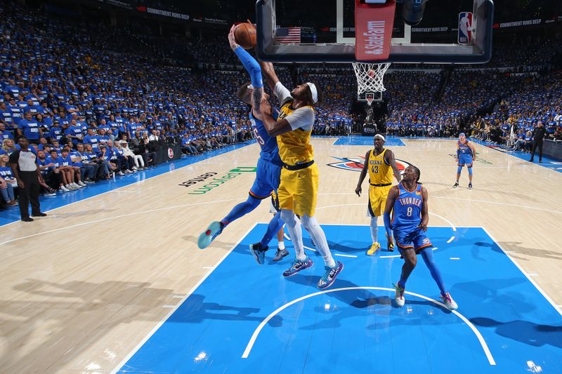 OKLAHOMA CITY, OK - JUNE 8: Myles Turner #33 of the Indiana Pacers block during the game against the Oklahoma City Thunder during Game Two of the 2025 NBA Finals on June 8, 2025 at Paycom Center in Oklahoma City, Oklahoma. NOTE TO USER: User expressly acknowledges and agrees that, by downloading and or using this photograph, User is consenting to the terms and conditions of the Getty Images License Agreement. Mandatory Copyright Notice: Copyright 2025 NBAE(Photo by Nathaniel S. Butler/NBAE via Getty Images)