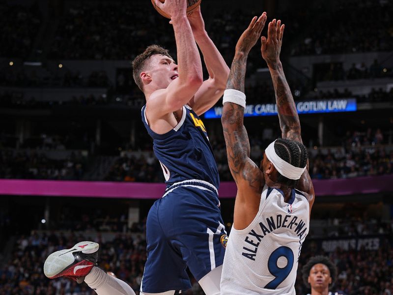 DENVER, CO - APRIL 10: Christian Braun #0 of the Denver Nuggets shoots the ball during the game against the Minnesota Timberwolves on April 10, 2024 at the Ball Arena in Denver, Colorado. NOTE TO USER: User expressly acknowledges and agrees that, by downloading and/or using this Photograph, user is consenting to the terms and conditions of the Getty Images License Agreement. Mandatory Copyright Notice: Copyright 2024 NBAE (Photo by Bart Young/NBAE via Getty Images)