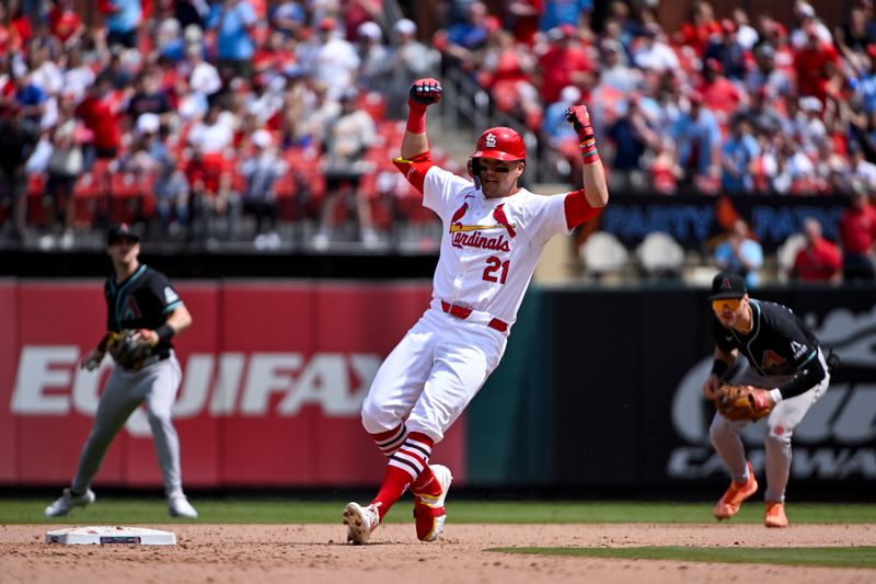 Apr 24, 2024; St. Louis, Missouri, USA;  St. Louis Cardinals left fielder Lars Nootbaar (21) reacts after hitting a two run double against the Arizona Diamondbacks during the eighth inning at Busch Stadium. Mandatory Credit: Jeff Curry-USA TODAY Sports