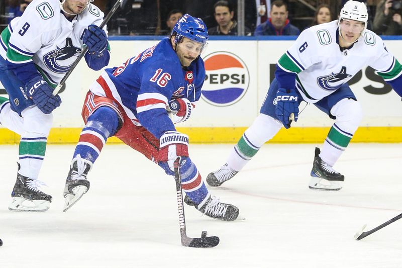 Jan 8, 2024; New York, New York, USA;  New York Rangers center Vincent Trocheck (16) controls the puck in the first period against the Vancouver Canucks at Madison Square Garden. Mandatory Credit: Wendell Cruz-USA TODAY Sports