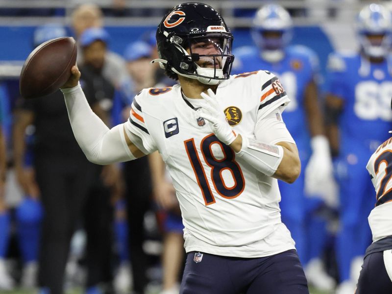 Chicago Bears quarterback Caleb Williams (18) passes against the Detroit Lions in the first half of an NFL football game in Detroit, Thursday, Nov. 28, 2024. (AP Photo/Rick Osentoski)