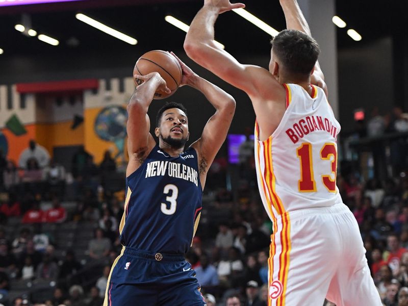 COLLEGE PARK, GA - OCTOBER 14: CJ McCollum #3 of the New Orleans Pelicans shoots the ball during the game against the Atlanta Hawks on October 14, 2023 at Gateway Center Arena in Atlanta, Georgia.  NOTE TO USER: User expressly acknowledges and agrees that, by downloading and/or using this Photograph, user is consenting to the terms and conditions of the Getty Images License Agreement. Mandatory Copyright Notice: Copyright 2023 NBAE (Photo by Scott Cunningham/NBAE via Getty Images)